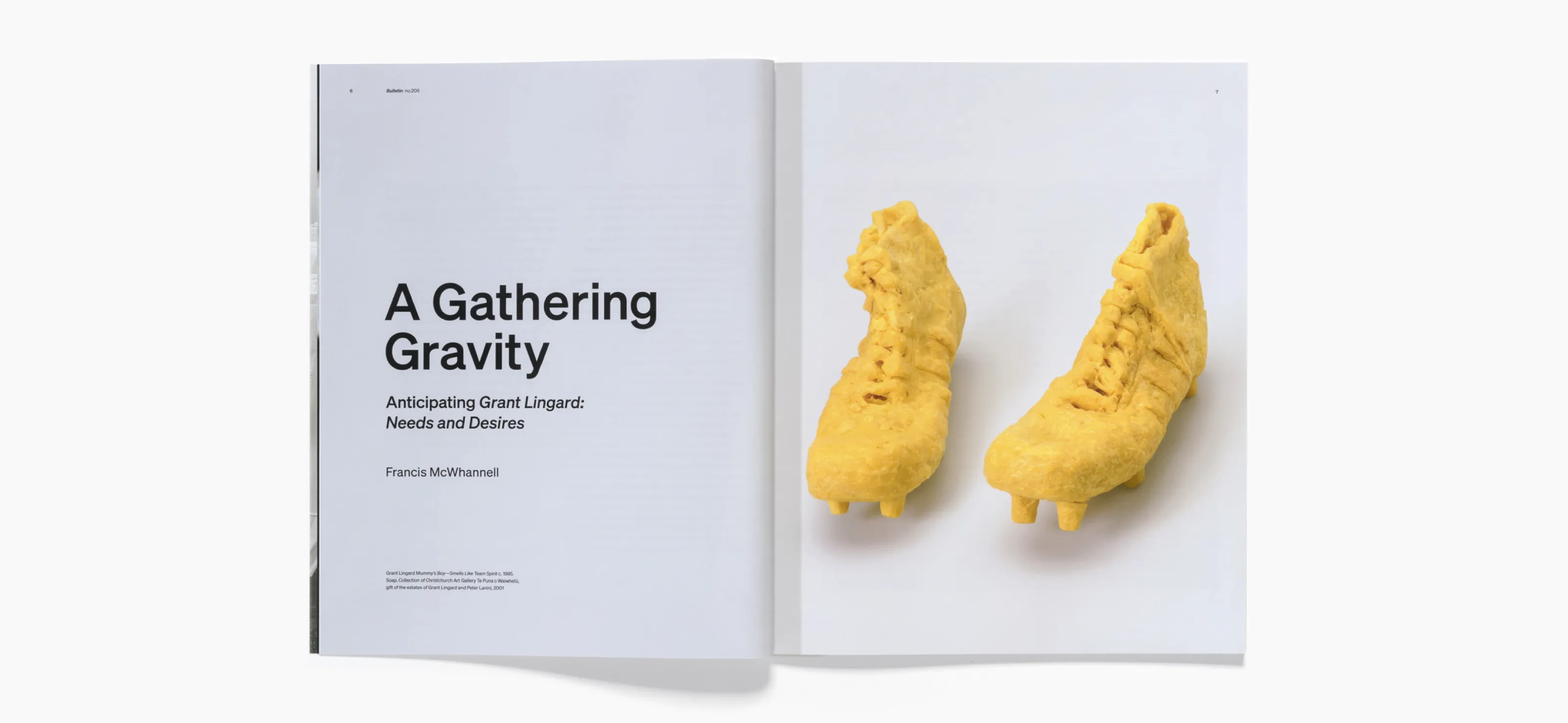 Open spread of a magazine with the left page titled 'A Gathering Gravity' by Francis McWhannell and the right page showing a pair of yellow sculpted rugby boots out of used soap.