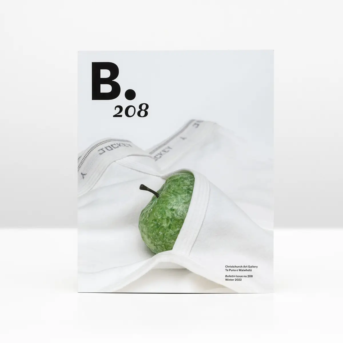 Cover of Bulletin 208 showing a green apple partially wrapped in white underwear with the black Bulletin logo.