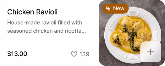 Plate of chicken ravioli in sauce garnished with herbs and spices.