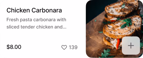 Close-up of a stacked chicken carbonara sandwich with toasted bread and a sprig of parsley on top.