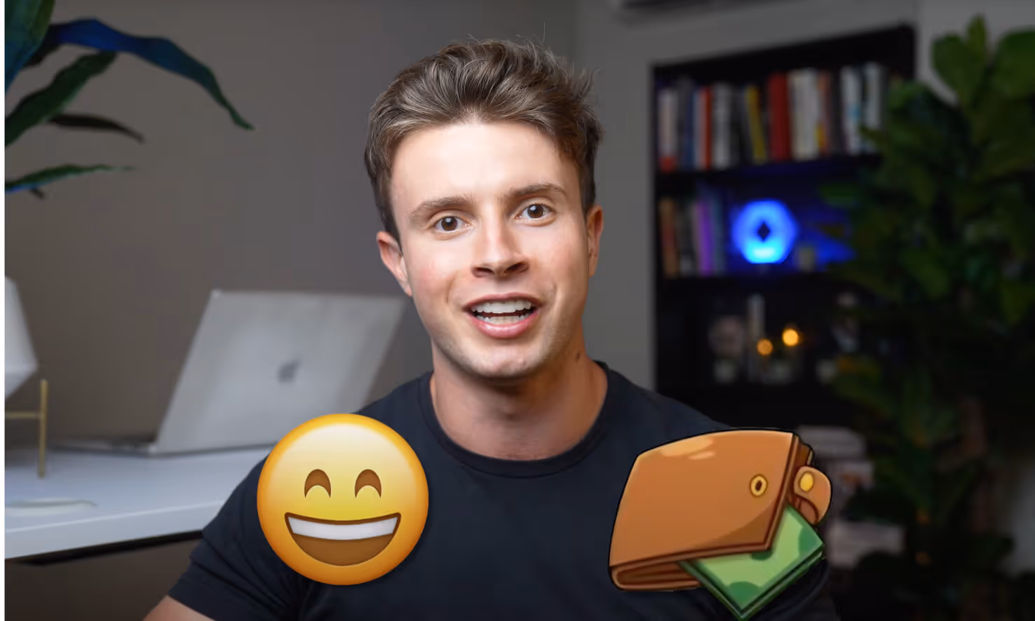 Smiling young man with brown hair sitting indoors with blurred bookshelf and laptop in background, smiling emoji and wallet with money graphic overlay.