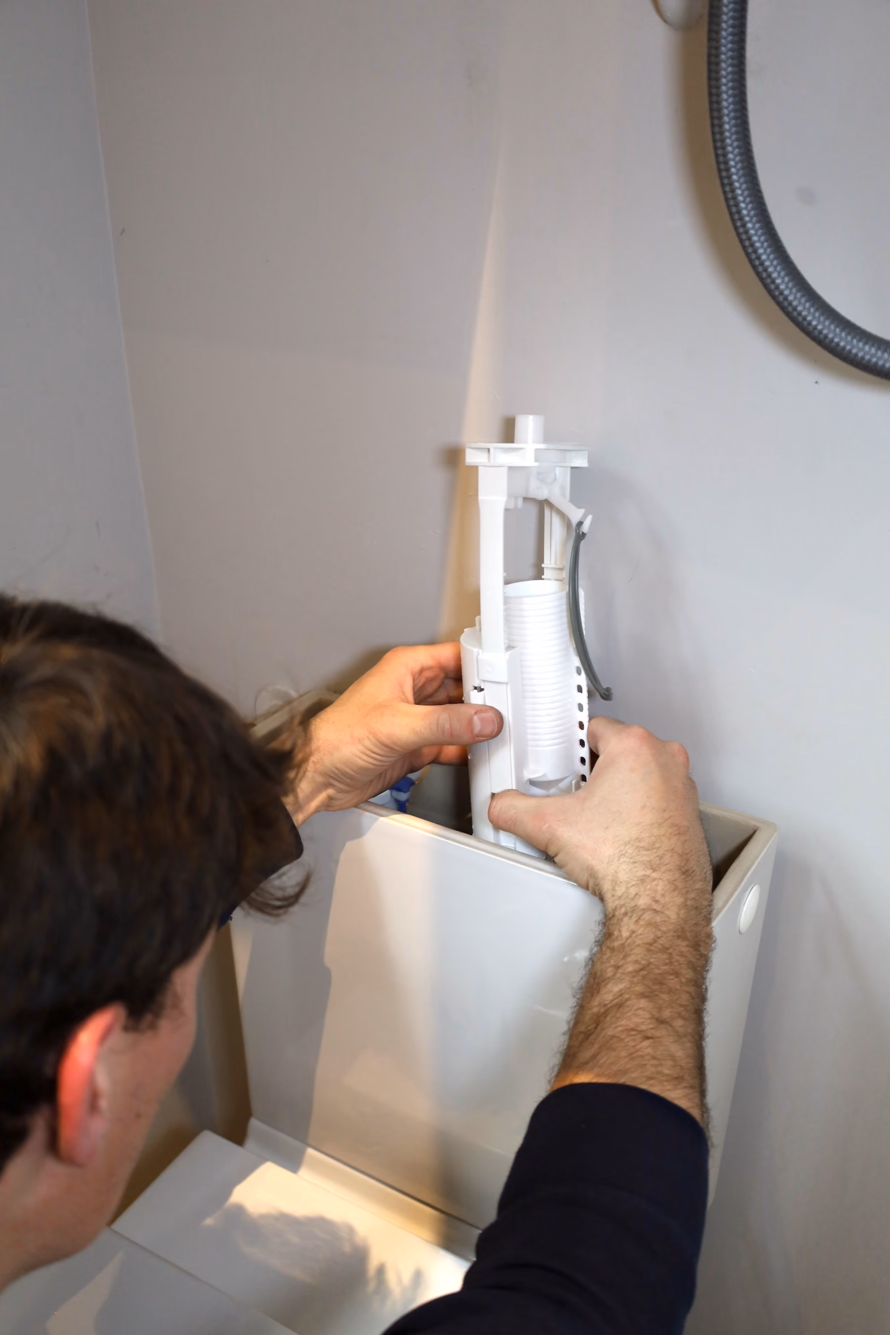 WC trop consommateur d'eau — remplacement double chasse par Coup de clé