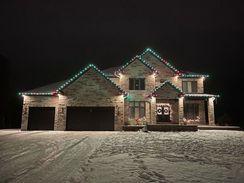 Installation de lumières de Noël à Bromont