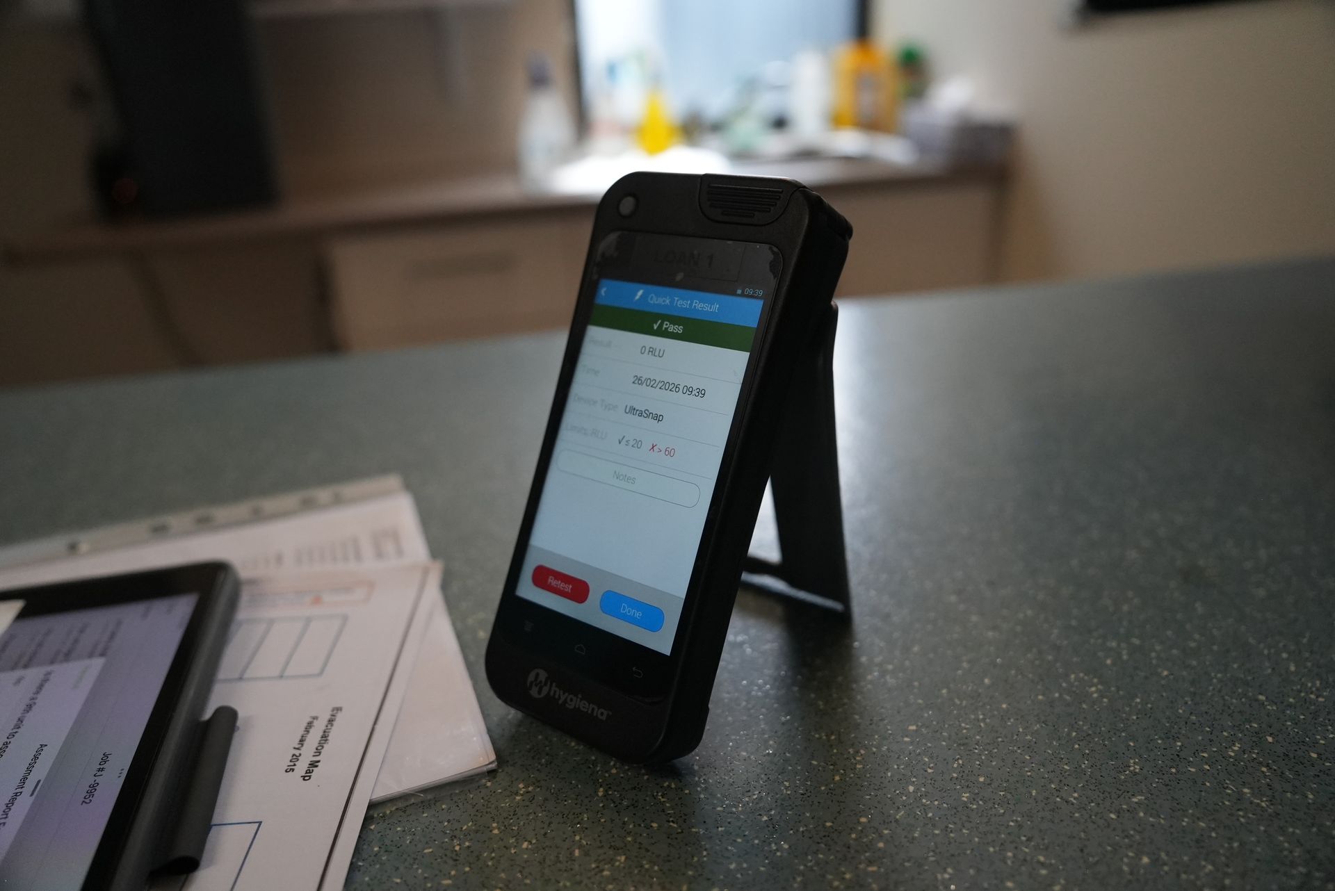 Oz Air Group hygiene test result on a tablet after an air conditioner clean