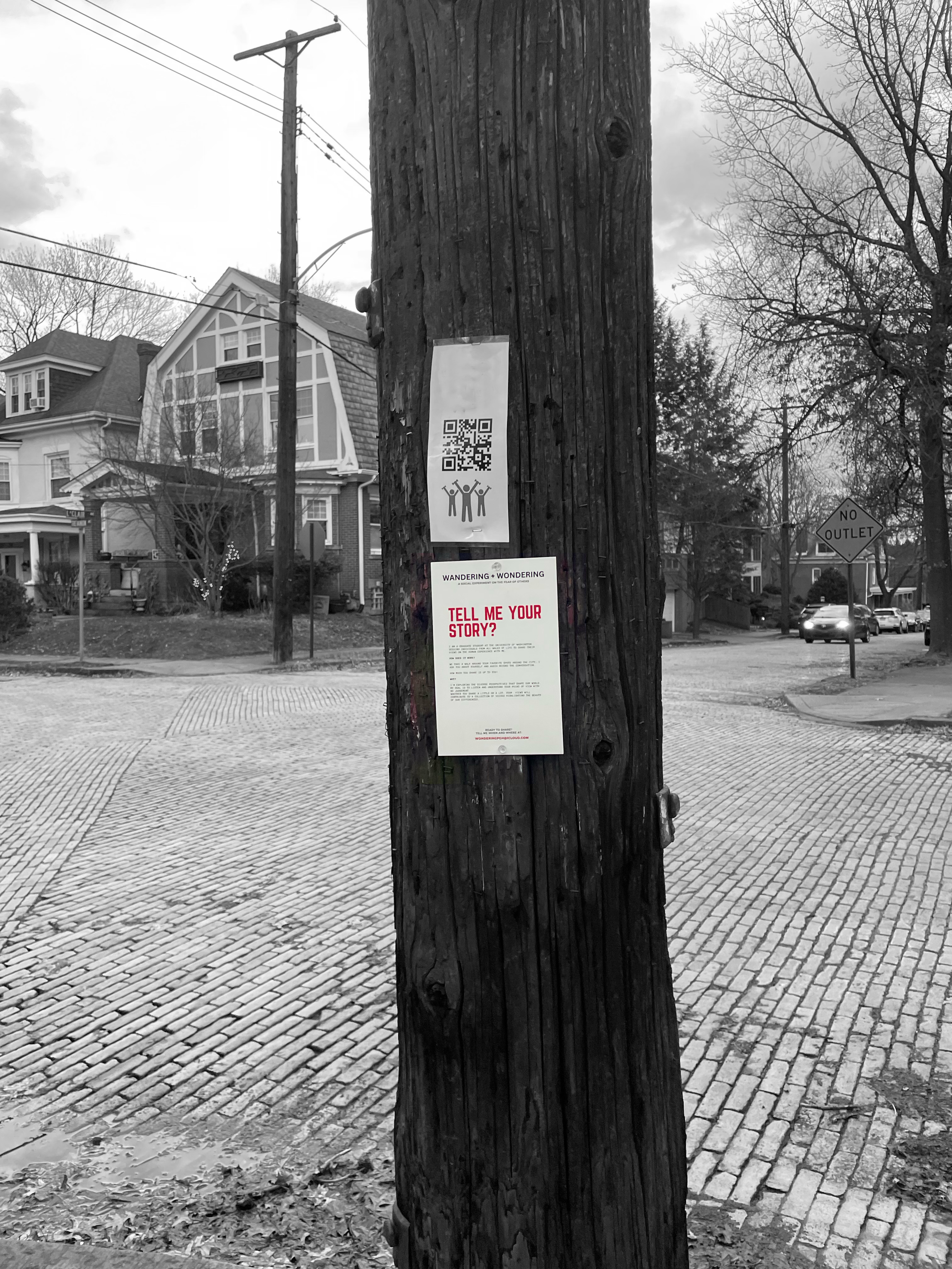 OurStories flyer on street pole