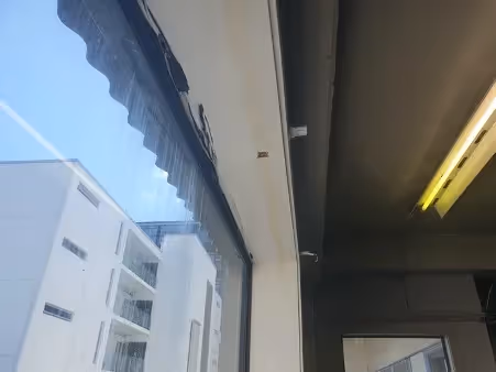 non-compliant window barrier showing rotting