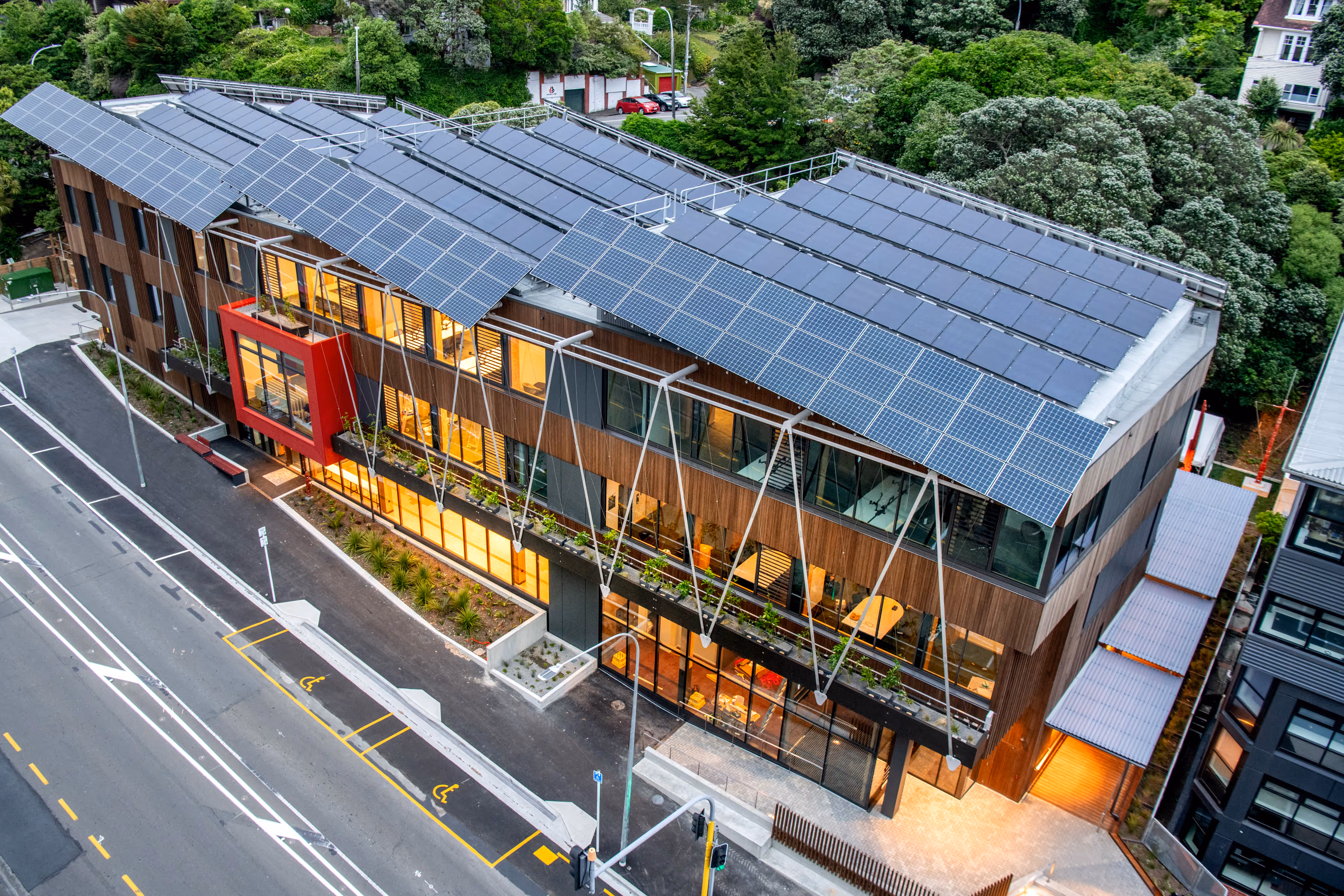 Drone view of Ngā Mokopuna at Victoria University—New Zealand’s first Living Building™ university project, showcasing its sustainable CLT structure from above.