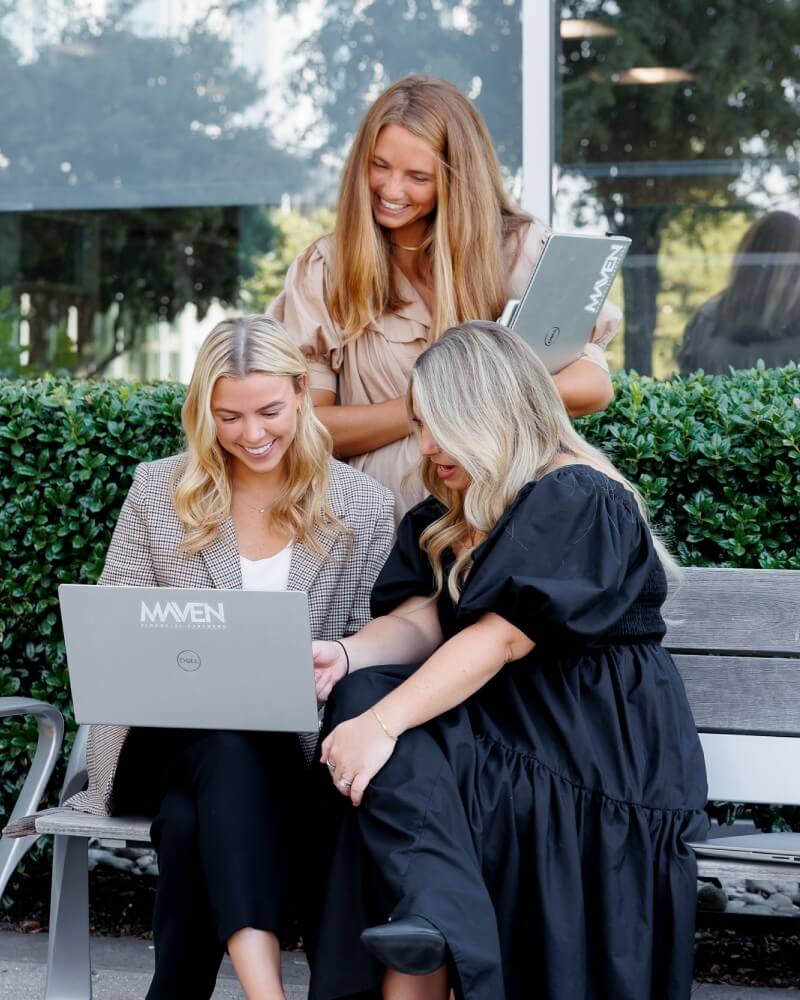 Team of professionals at Maven FP discussing financial strategies, led by a Dental Fractional CFO Richardson to support local dental practice growth