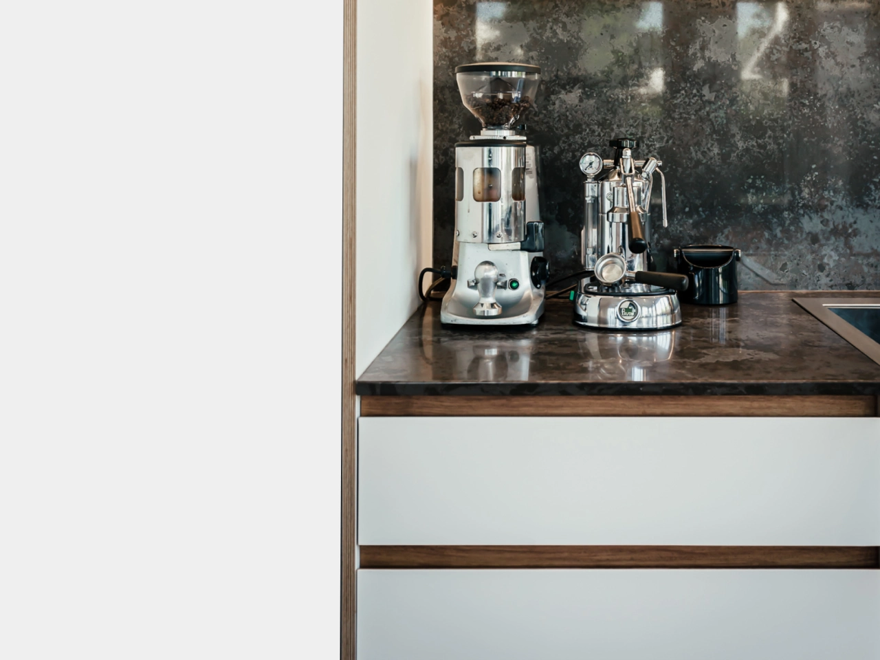 Coffee machine on kitchen bench top 