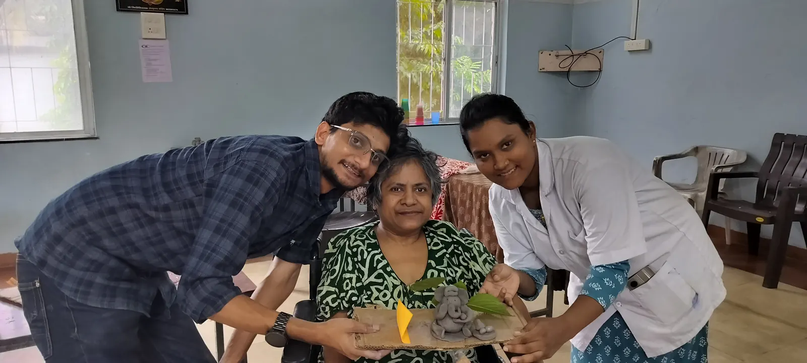 Doctors and caregivers with residents at GeriaTree