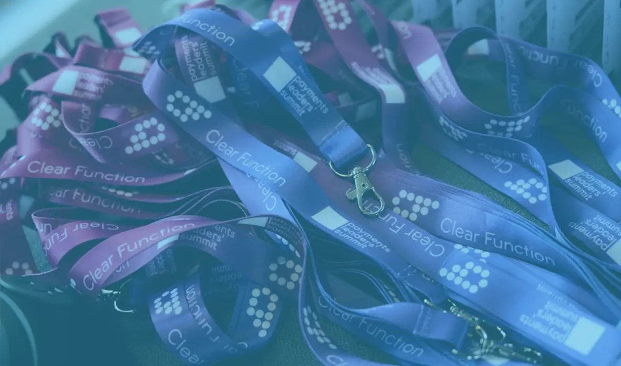 Close up of conference lanyards with the Clear Function logo on it.