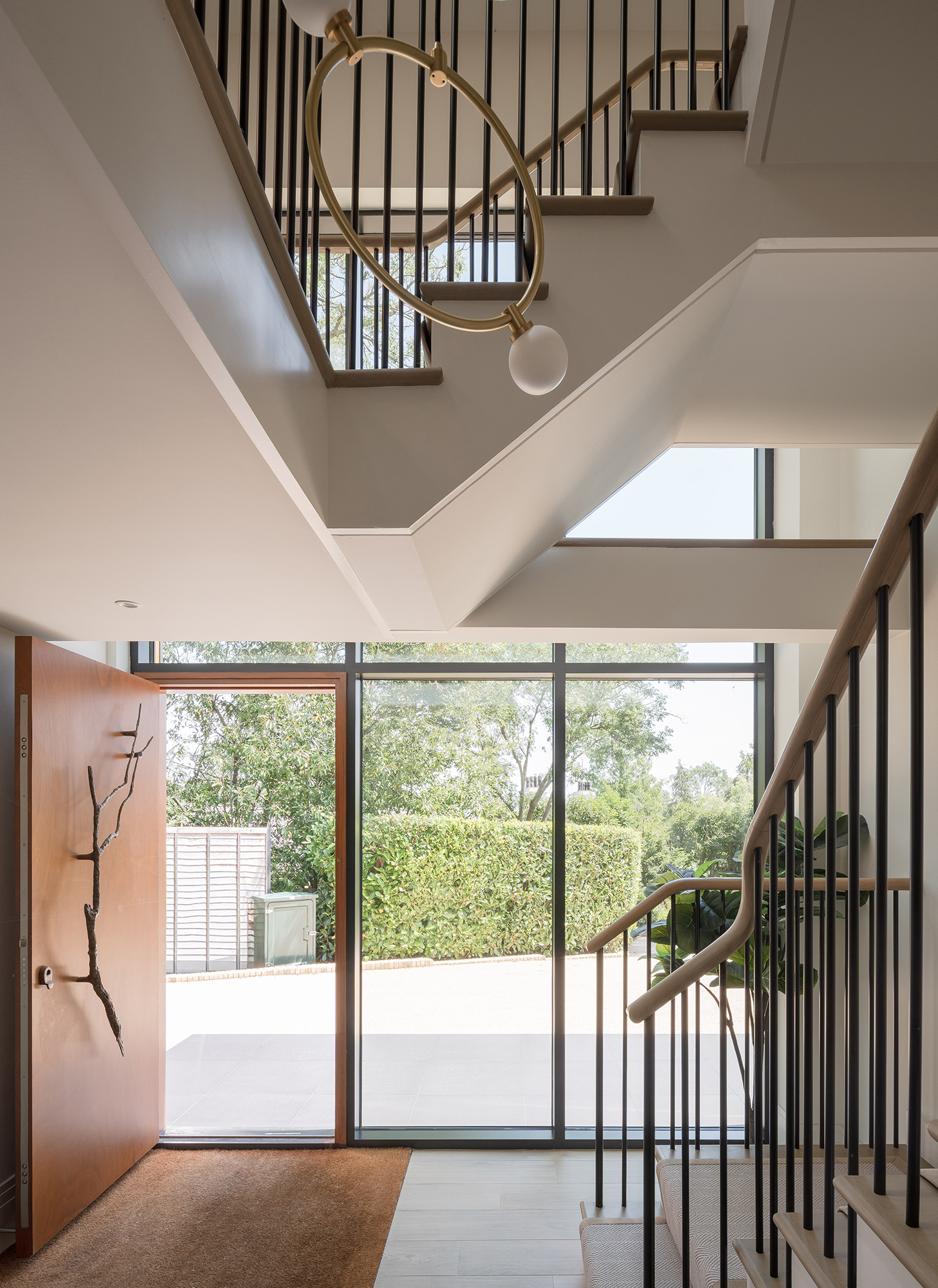contemporary staircase design with glazed doors