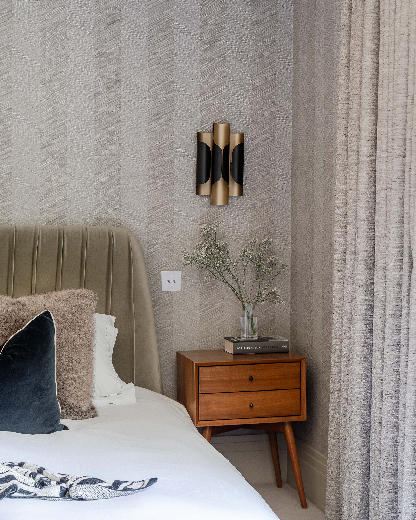 Bedroom with custom wallpaper and integrated nightlights