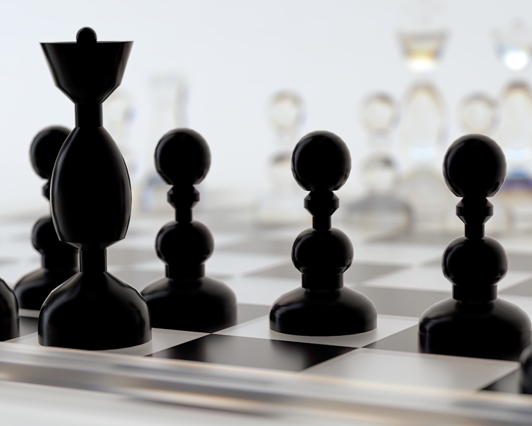 Gros plan sur des pièces d’échecs noires sur un échiquier, symbolisant les avancées stratégiques de la technologie IA, pertinentes pour les futures tendances en matière d’IA générative.