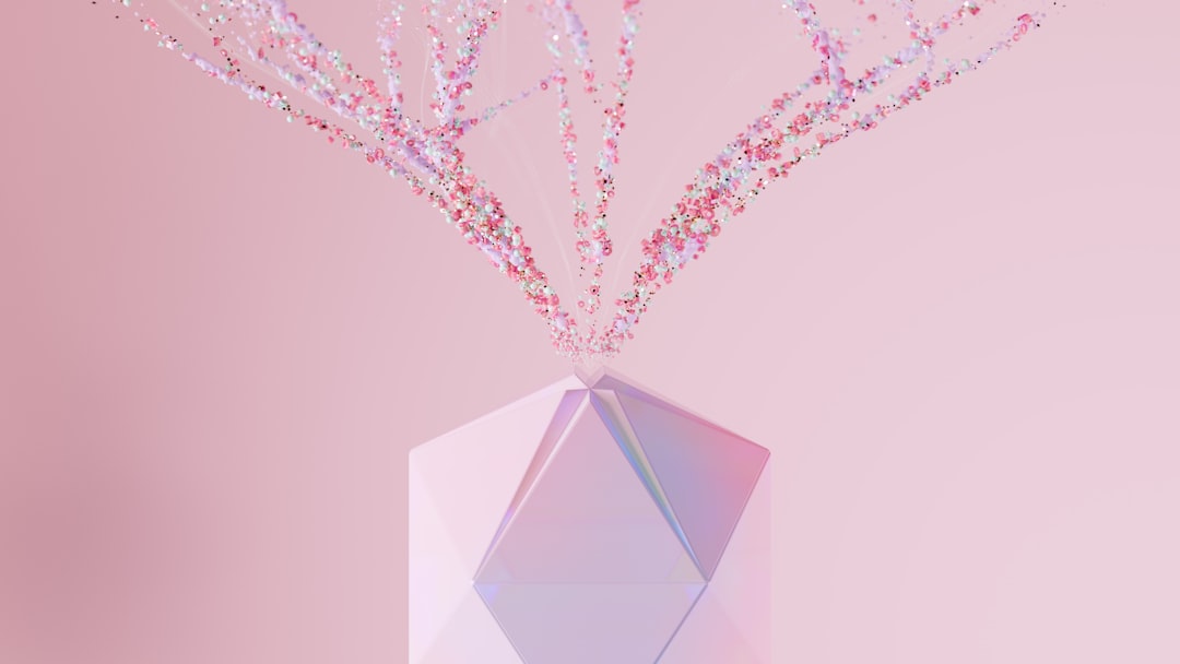 Forme géométrique abstraite avec des particules colorées émergeant, symbolisant la croissance créative et innovante des tendances en matière d’IA générative pour 2025 et au-delà.