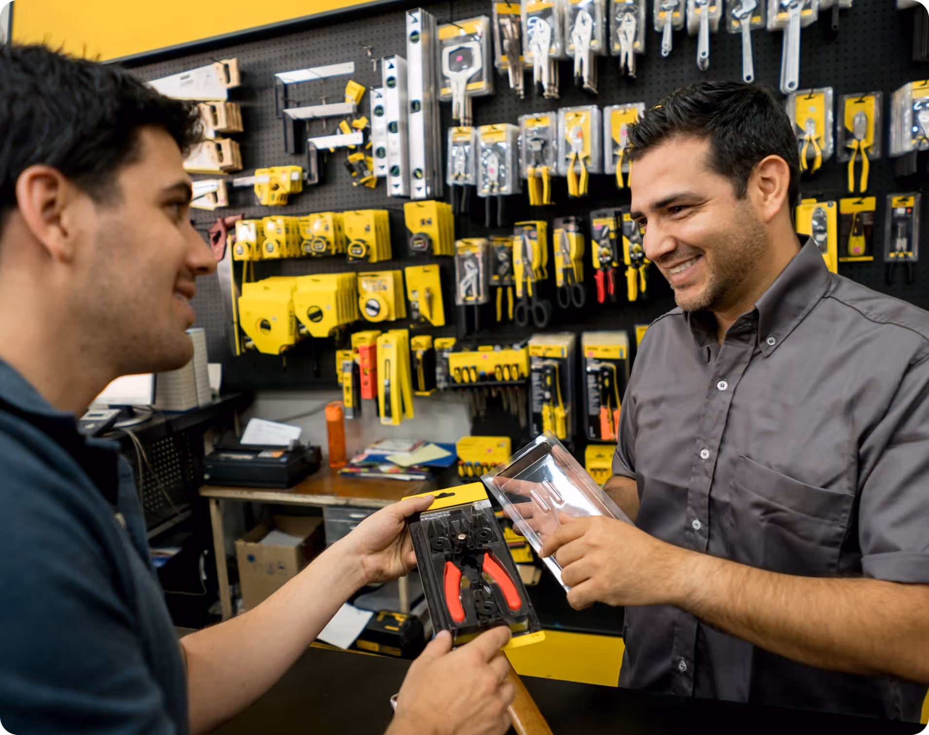 Hardware staff assisting a customer