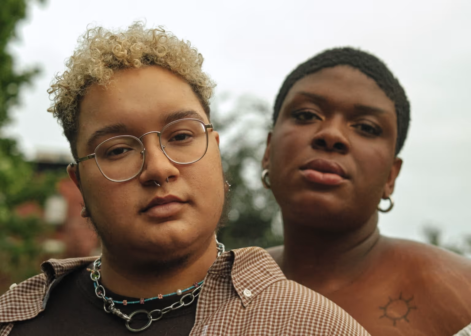 Two people look to the camera