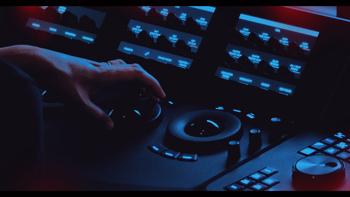 A hand on a control panelAI-generated content may be incorrect.