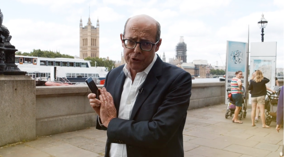 Nick Robinson from BBC standing in front of River Thames.