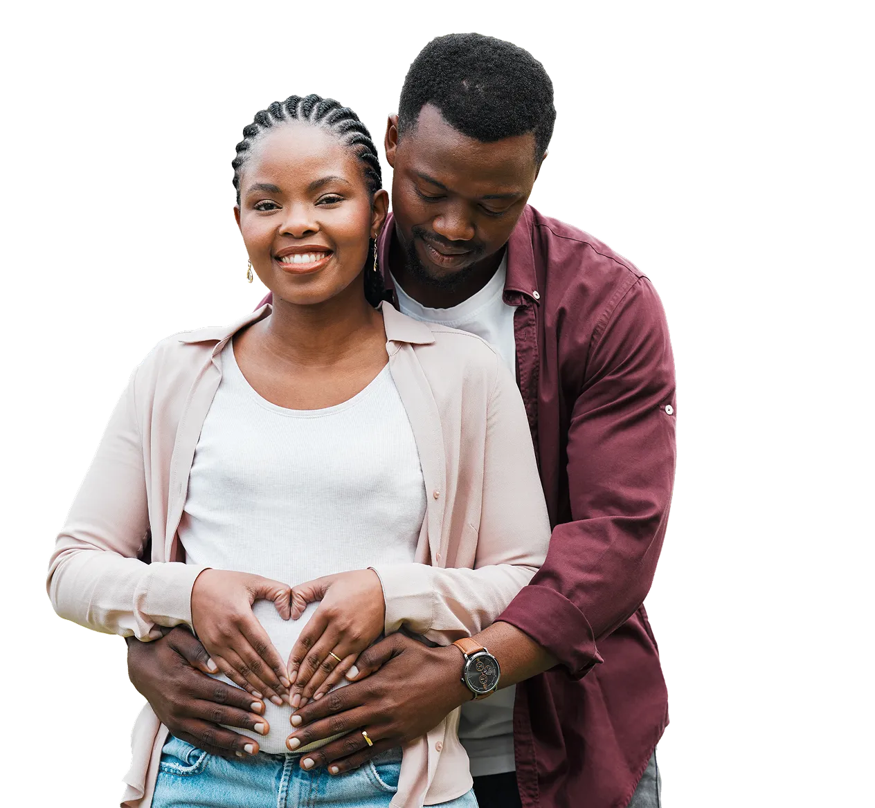 A smiling couple, with the woman visibly pregnant