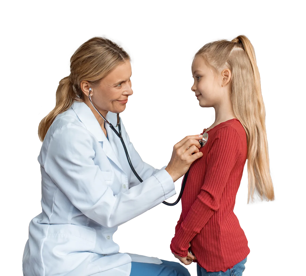 Female doctor using a stethoscope to check a young girl’s heartbeat.
