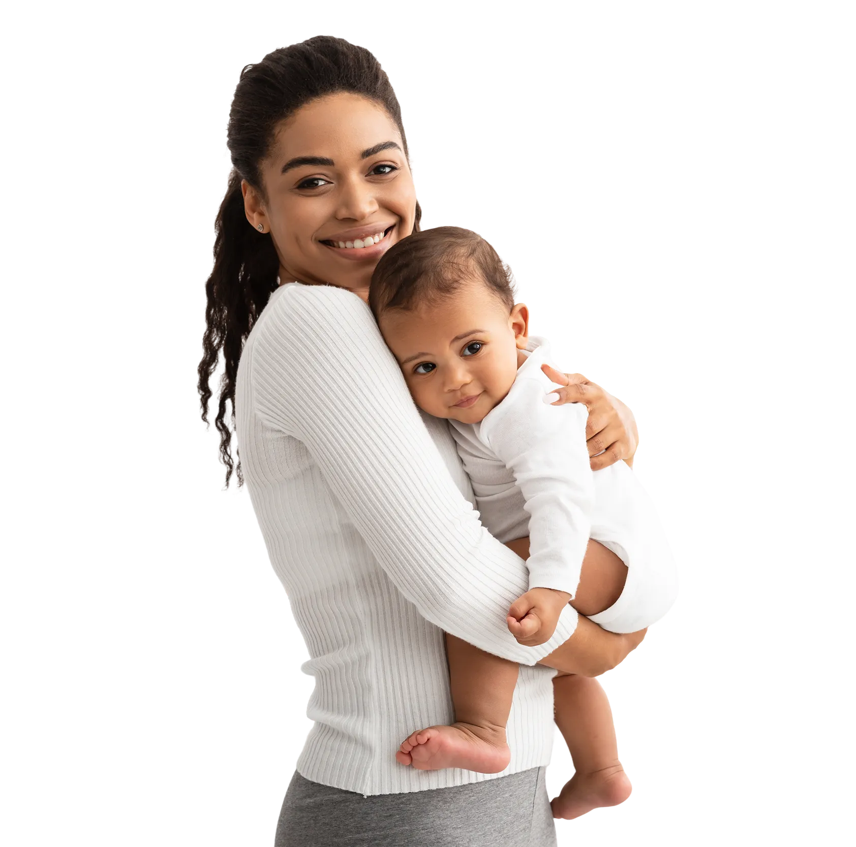 Smiling woman holding a baby dressed in white, both looking content and close together.