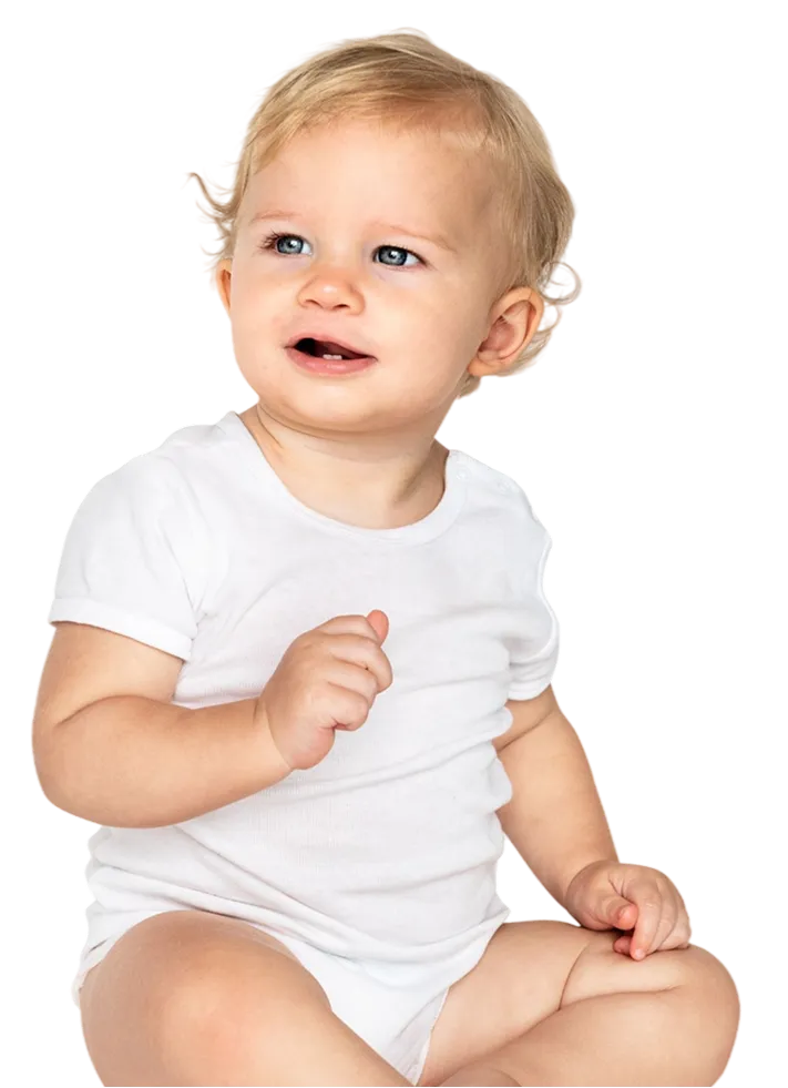 Blond baby with blue eyes sitting and looking slightly to the side, wearing a white short-sleeve onesie.