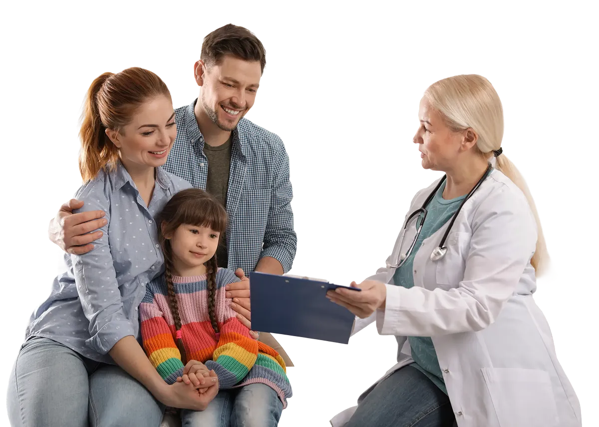 Smiling doctor shows clipboard to a happy family with a young girl in a colorful sweater.