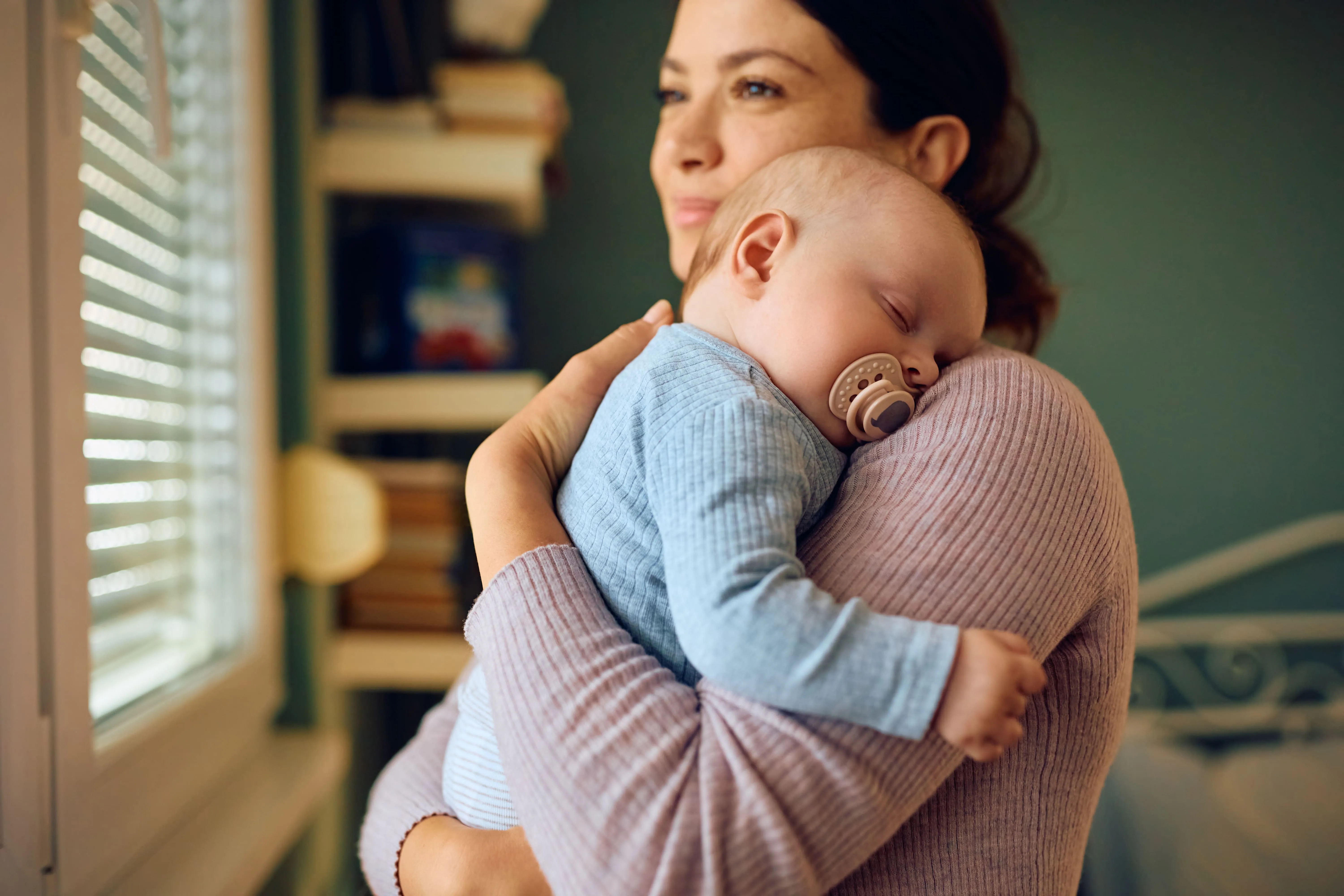 Mom and baby cuddling