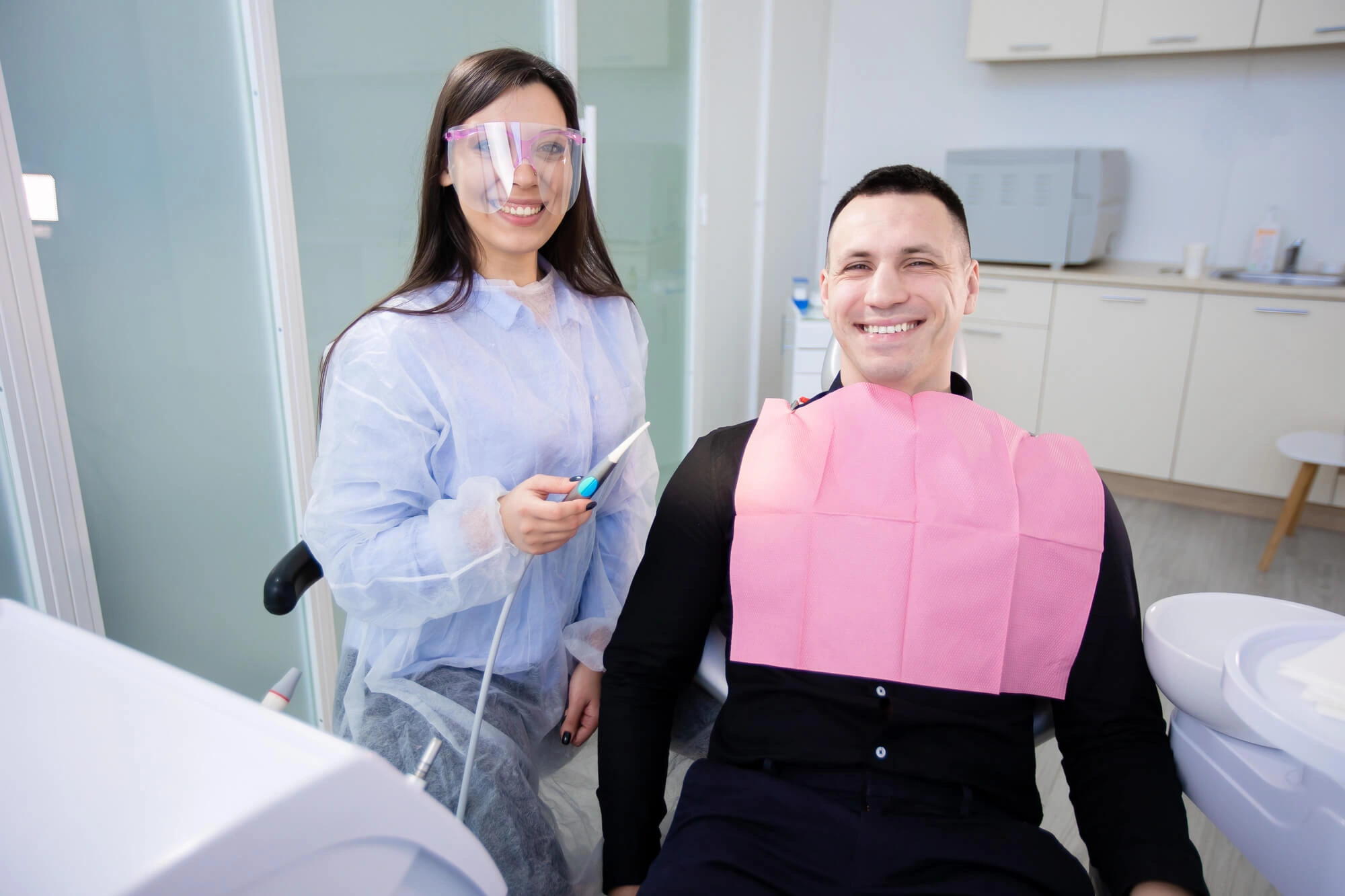 Man smiling with dentist auburn