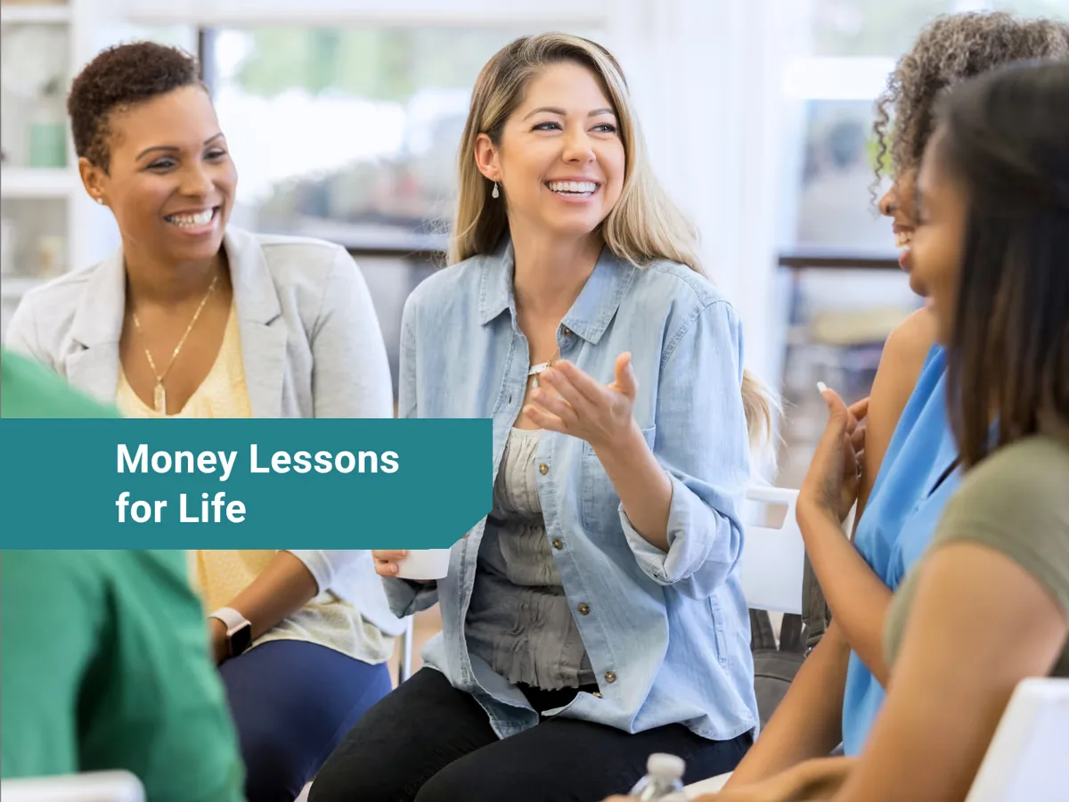 Structured post graphic: Money Lessons for Life, over a photo of a group of women talking in a workshop.