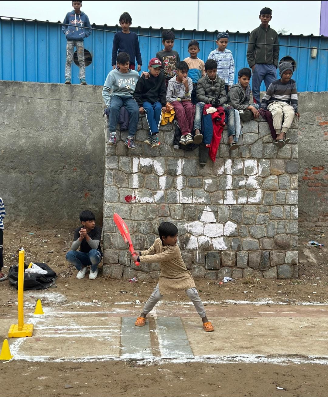 Cricket session at the Nizamuddin Basti