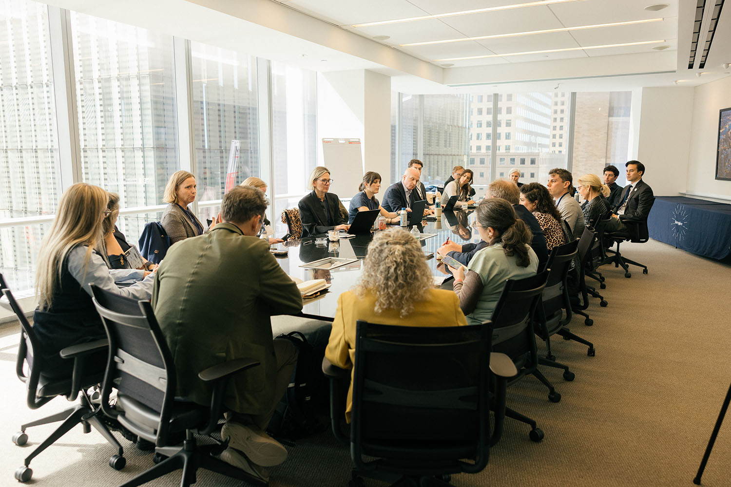 Climate stakeholders discussing around board room table at Port Powerhouse Climate Week 2026