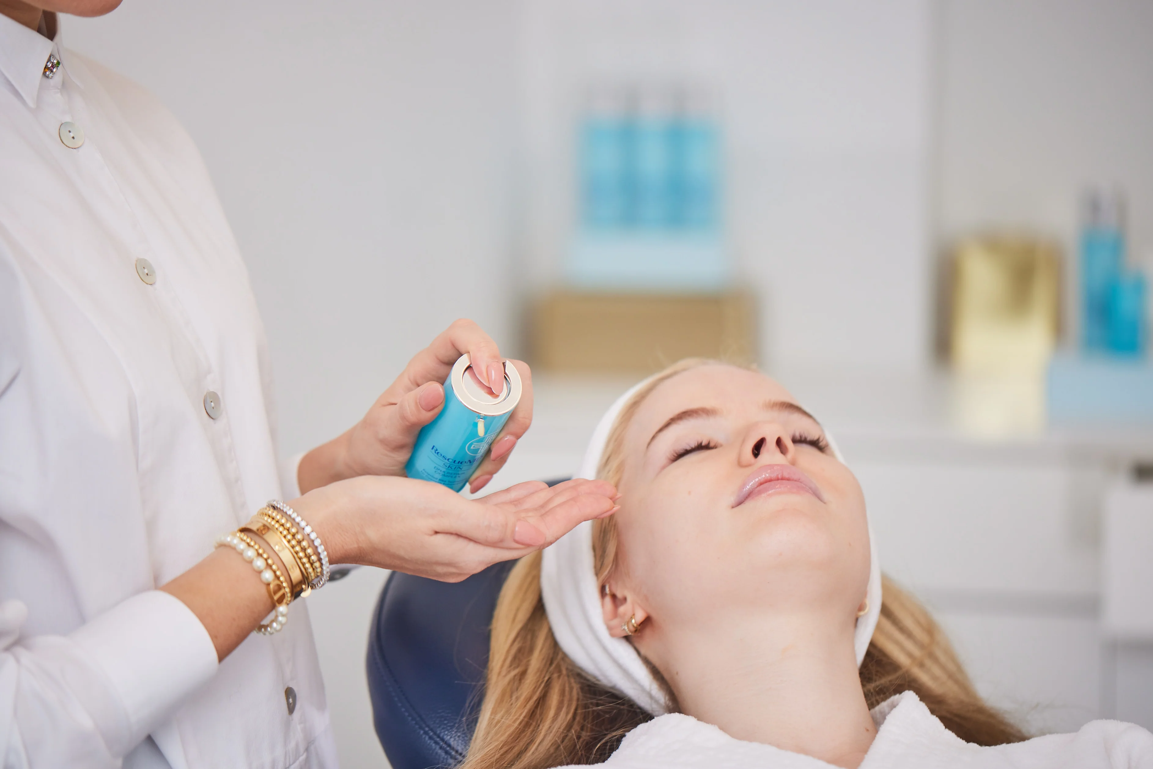 Patient applying moisturizer to contact dermatitis rash. 