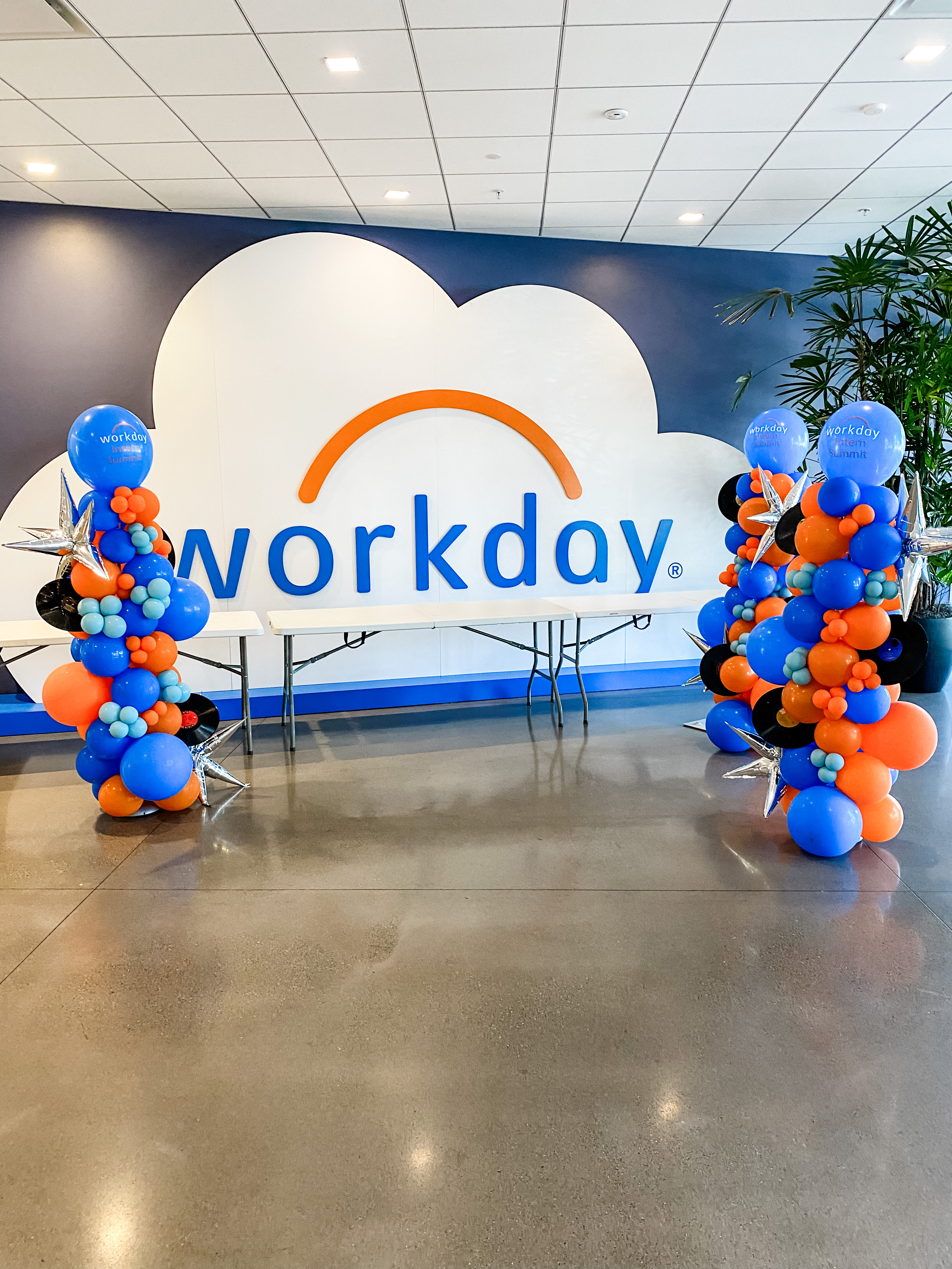 Workday corporate photo frame with coordinated balloon decor by Poptastic Parties