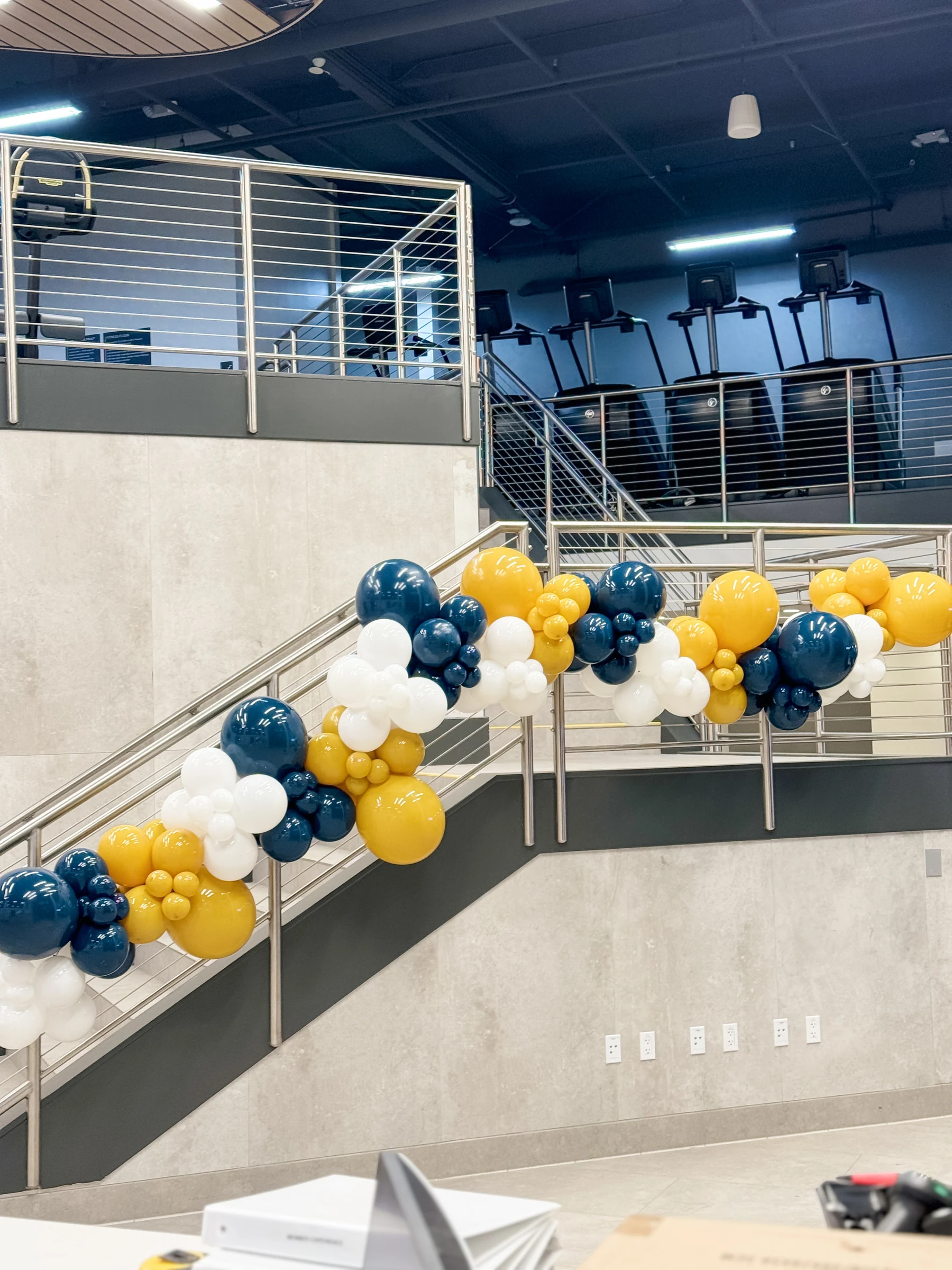 Grand-opening staircase installation by Poptastic Parties