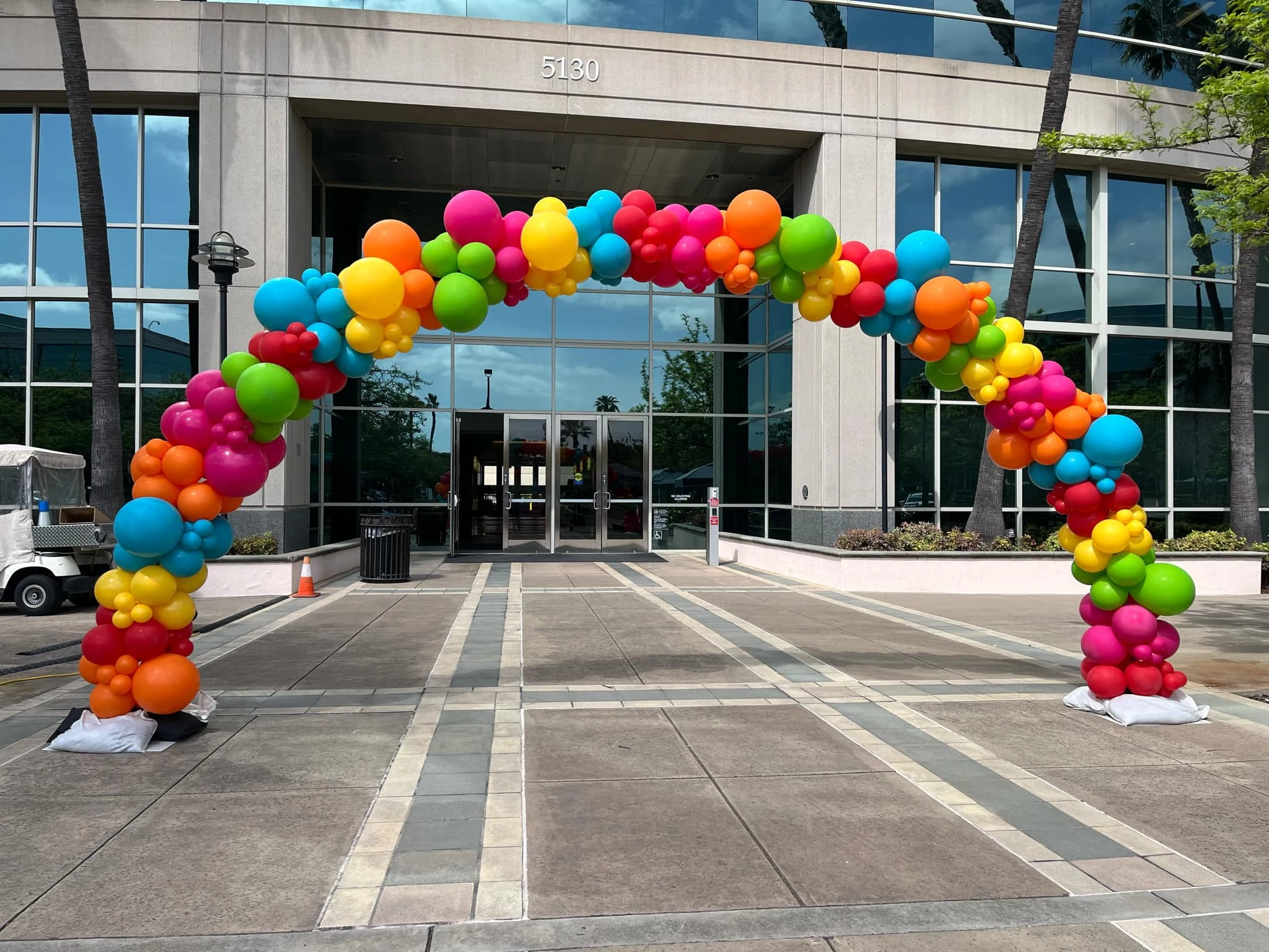 Rainbow entrance arch by Poptastic Parties