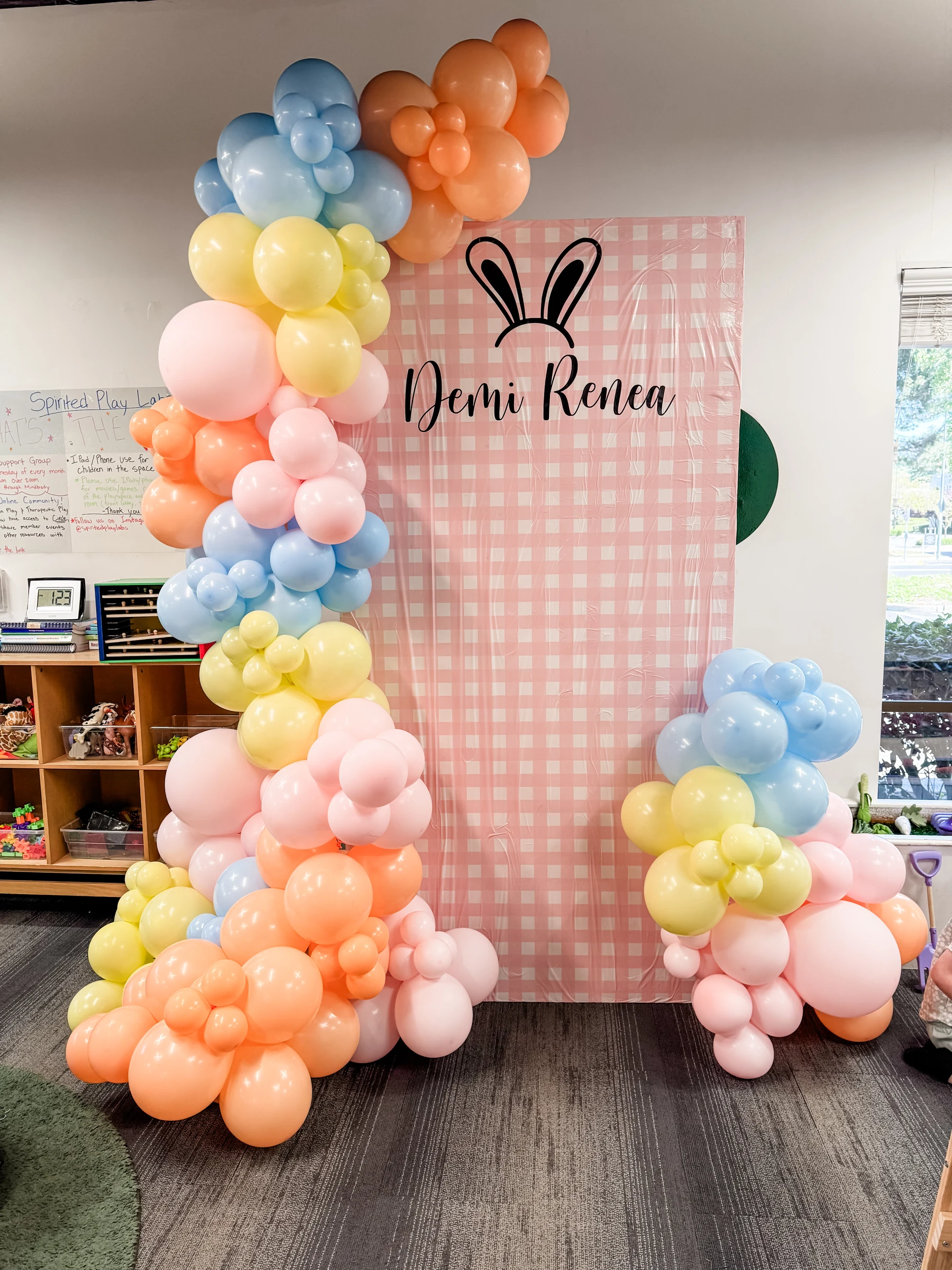 Pastel bunny birthday backdrop by Poptastic Parties