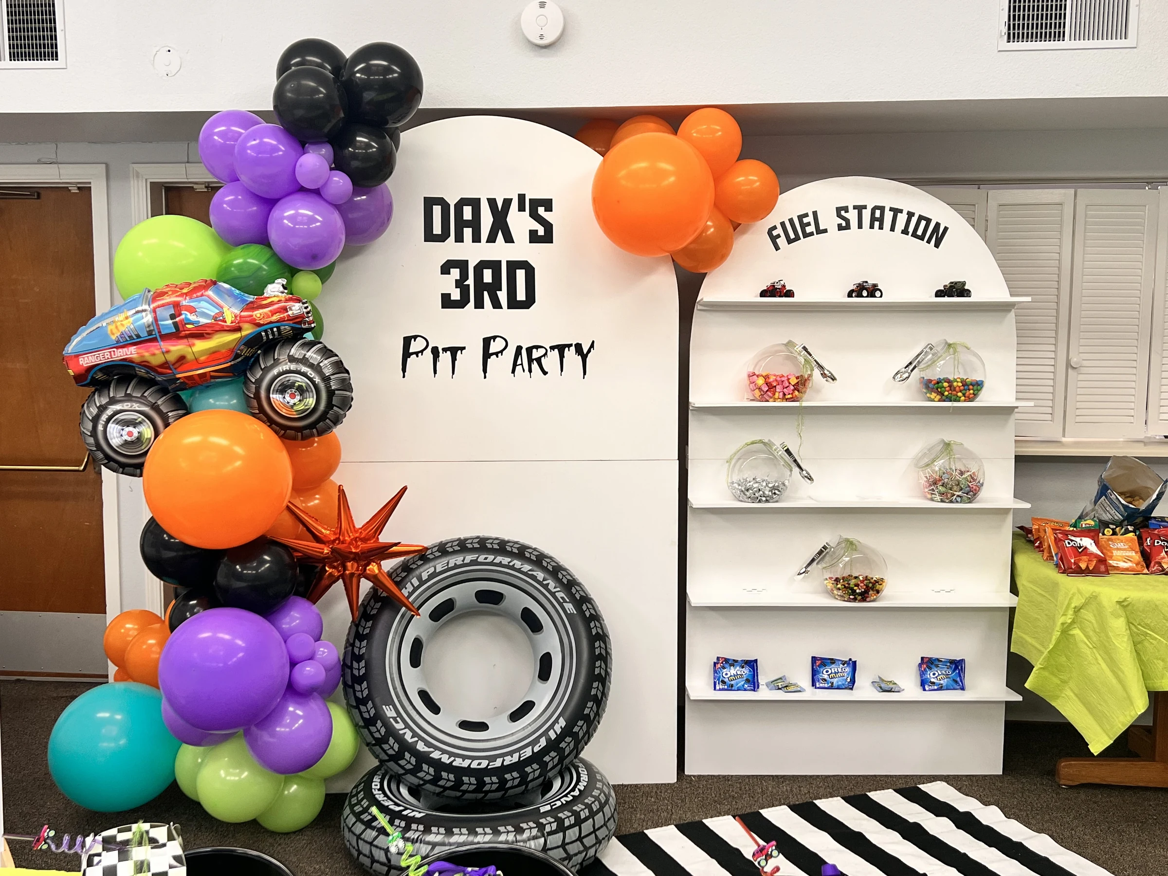 Fuel-station birthday backdrop by Poptastic Parties