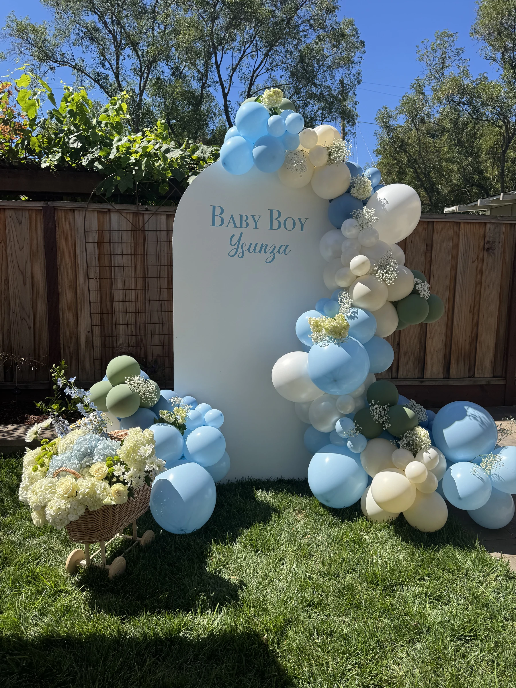 Blue and white floral baby backdrop by Poptastic Parties