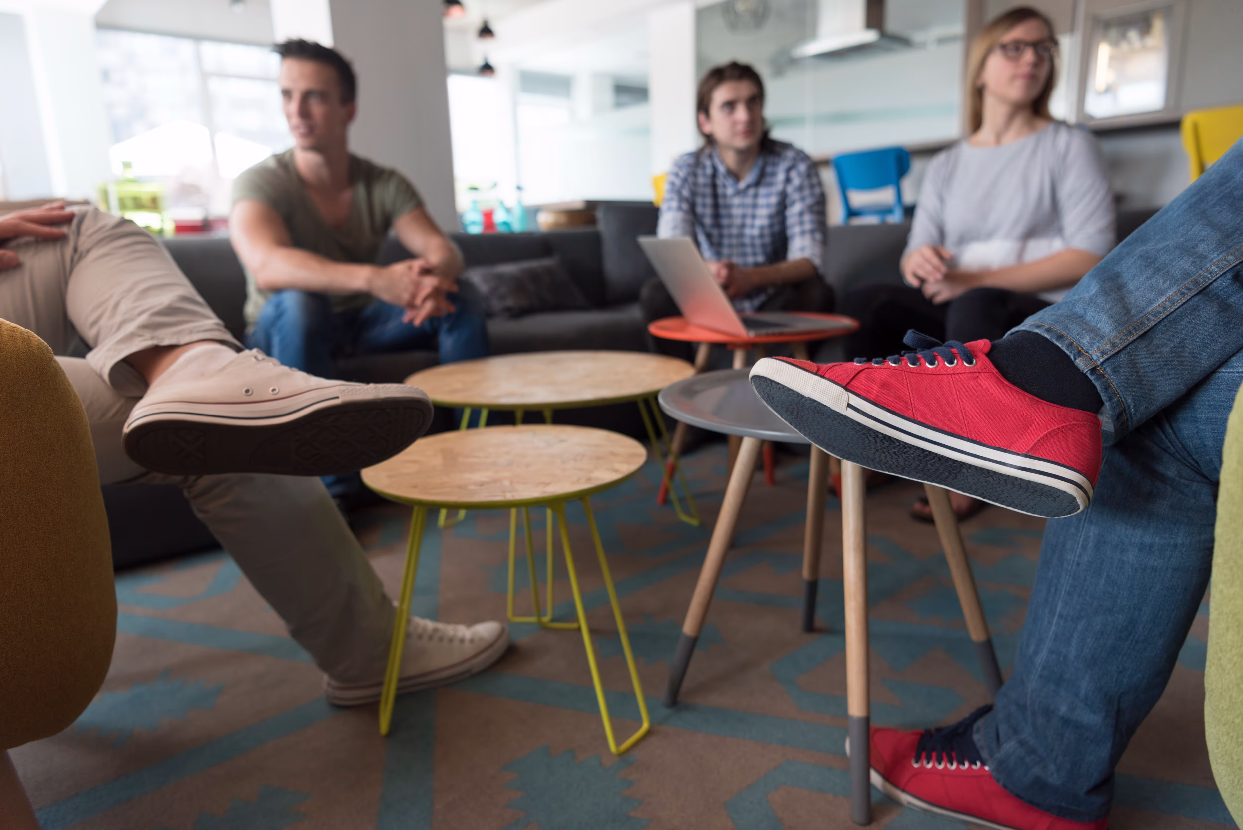 Brightter team discussion in a break room