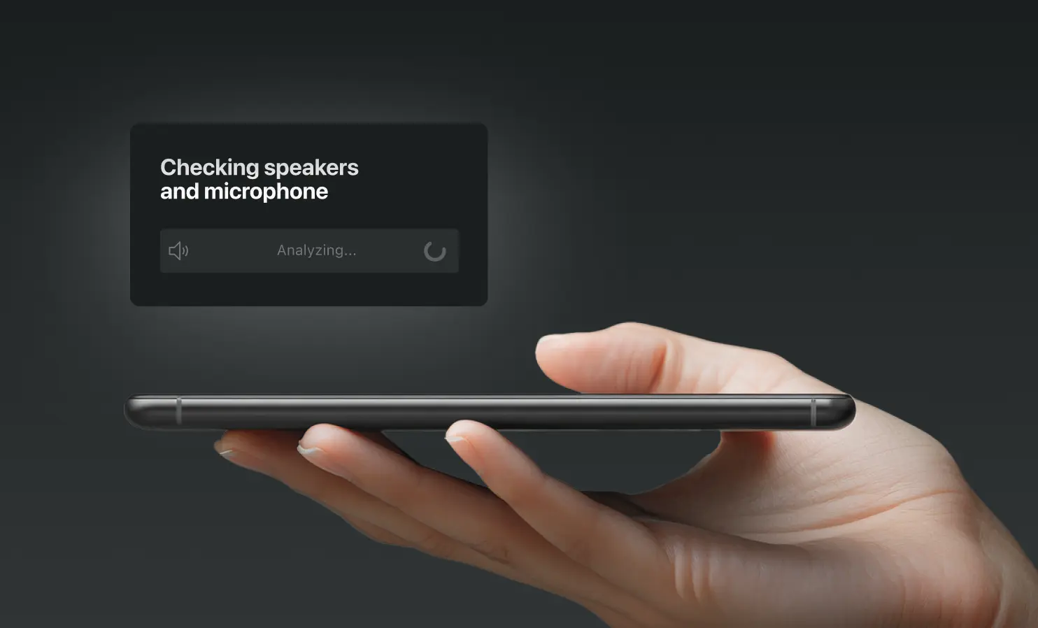 Hand holding a smartphone horizontally with a screen overlay showing 'Checking speakers and microphone' and a loading indicator.