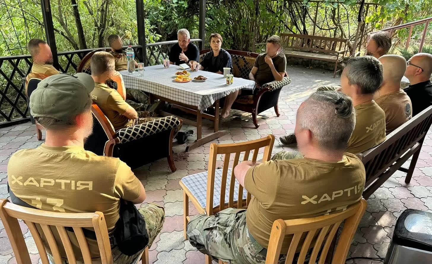 Infantrymen serving in Khartiia who for some reason used r&r time to listen to a historian perorate in bad Ukrainian
