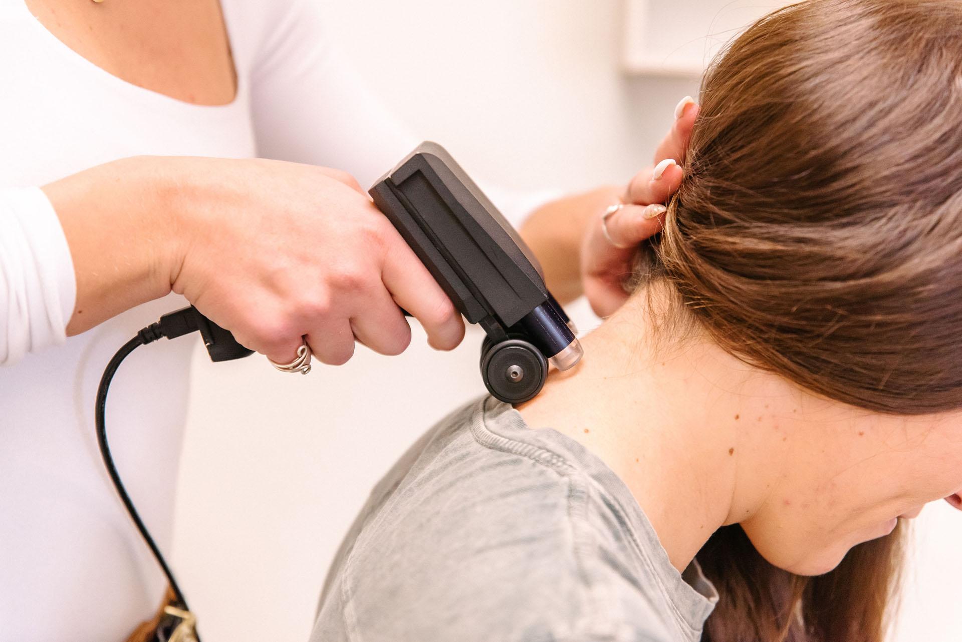 Modern upper cervical chiropractic treatment room at Peak Upper Cervical Center in Boise with gentle alignment adjustment table