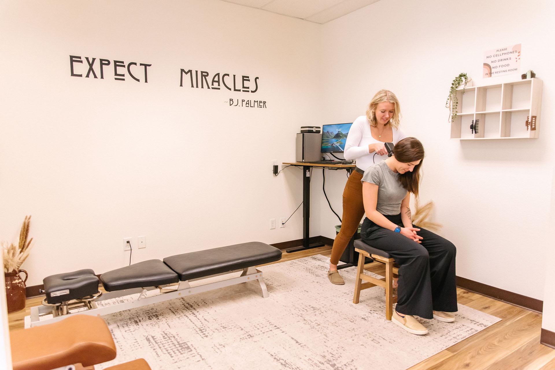 Modern upper cervical chiropractic clinic in Boise with supplements on side table supporting concussion recovery care