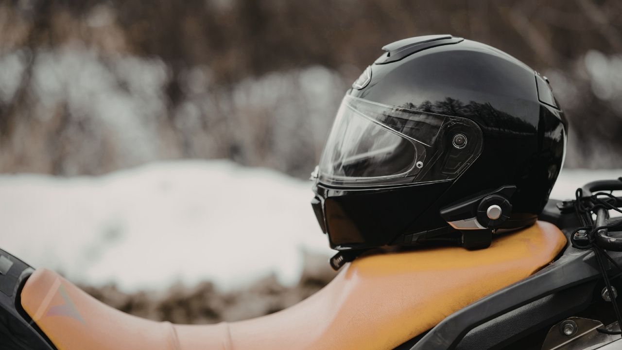  Sports helmet resting on wooden surface representing brain and nervous system protection during athletic activity