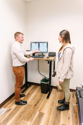Modern upper cervical chiropractic consultation room at Peak Upper Cervical Center in Boise representing precision spinal evaluation and care