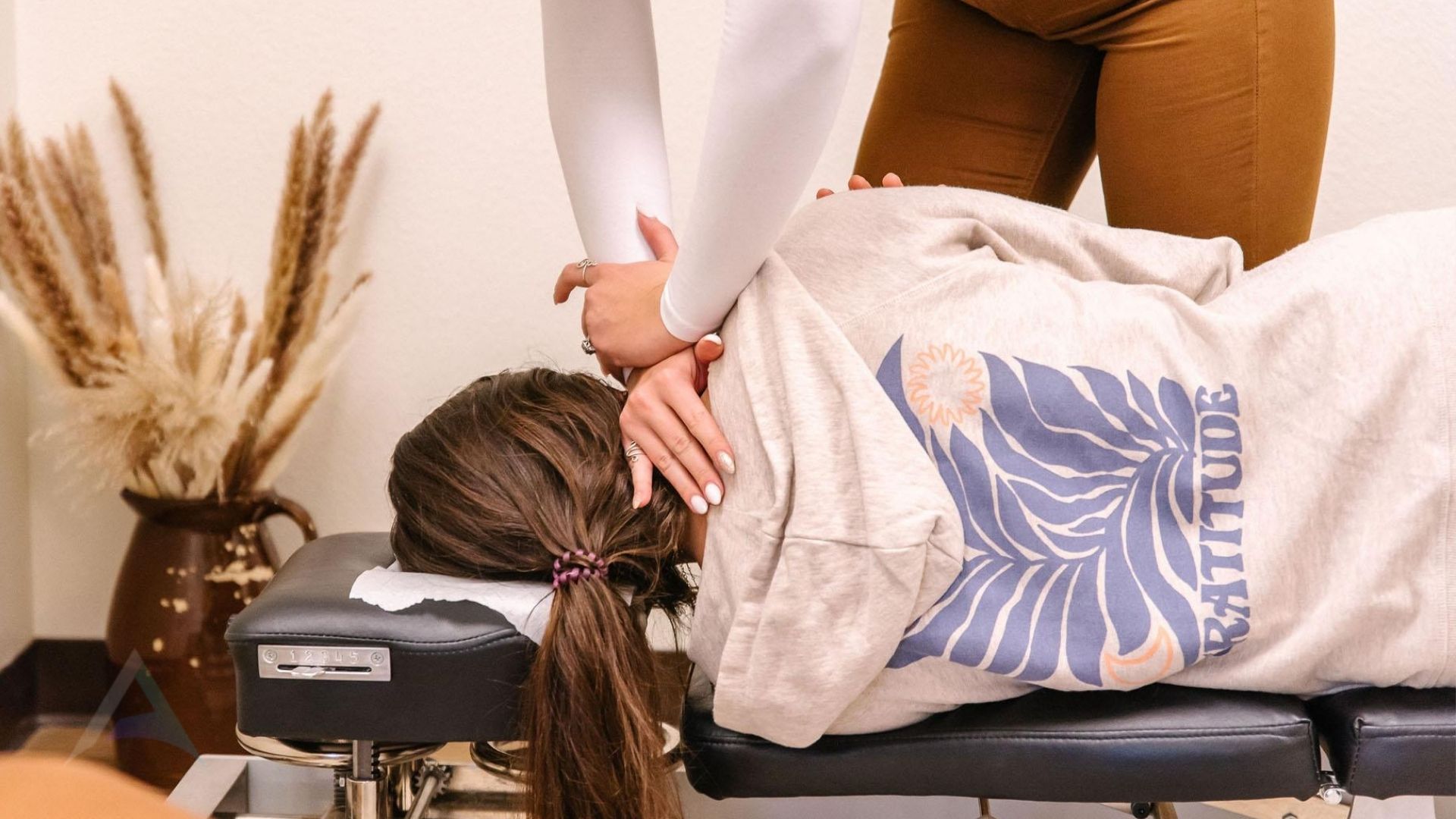 representing the personal act of sharing upper cervical chiropractic care as a thoughtful recommendation to loved ones