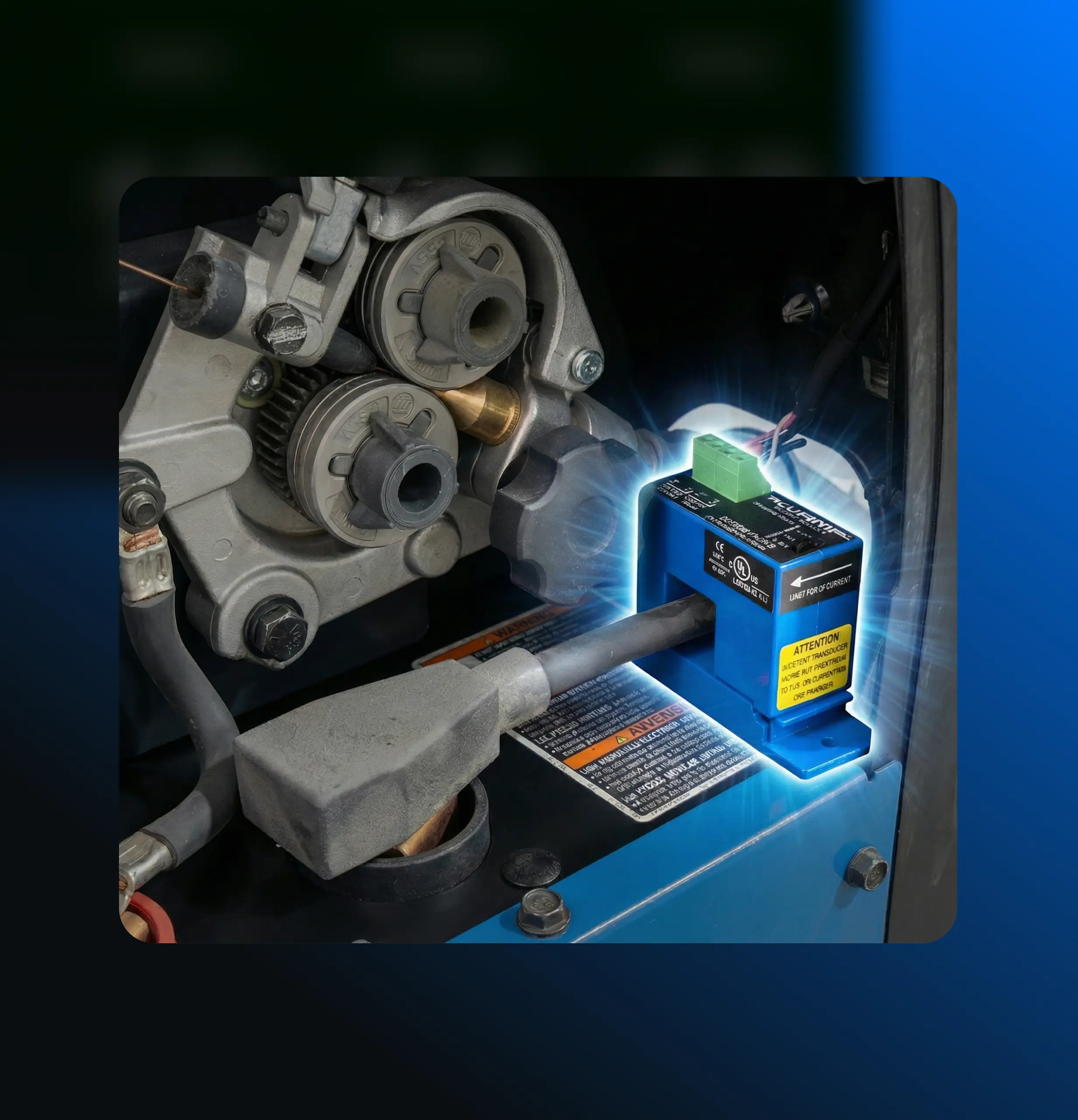 Close-up of a non-intrusive current sensor installed on a welding station to measure real-time arc time.