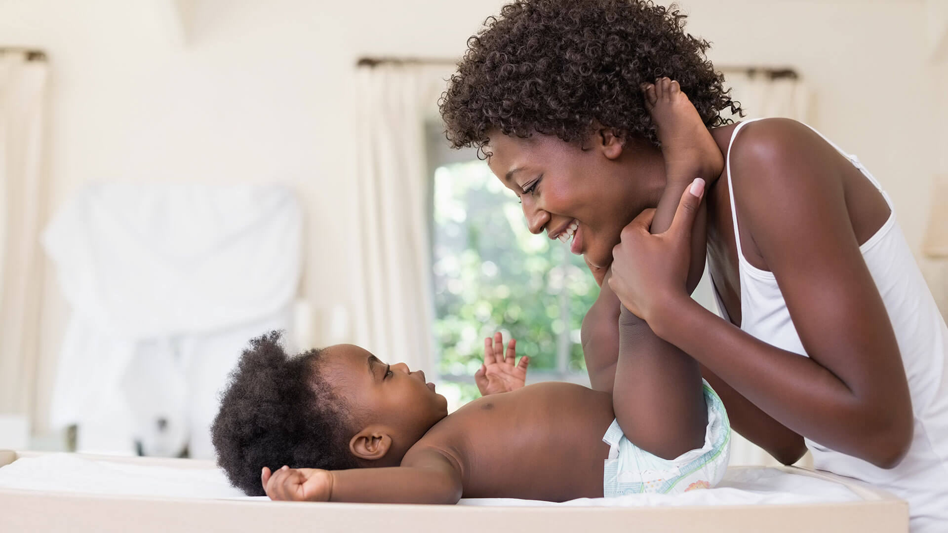 A mother and her child, with Pediatric Clinical Trial Support provided by ObvioHealth